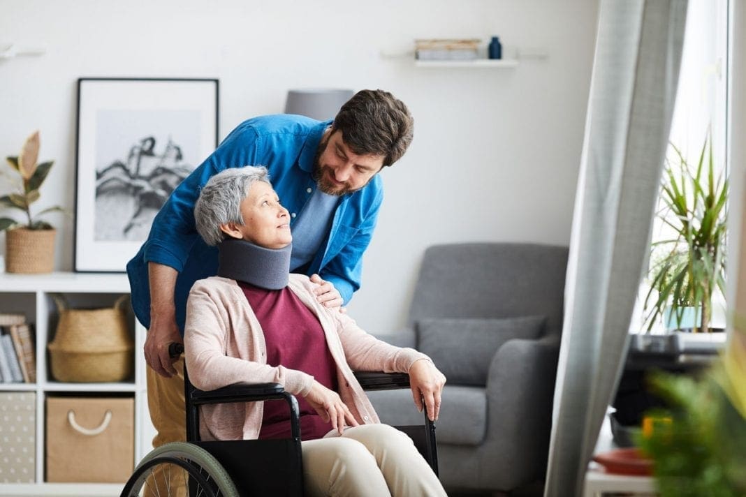 Senior woman undergoing rehabilitation 11860 Vista Del Sol, Ste. 128 Neck Brace or Collar for Neck Pain Disorders
