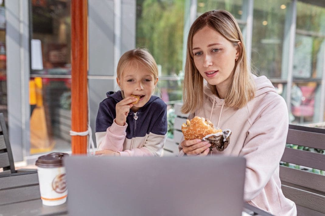 young-caucasian-mother-and-daughter-eating-cheeseb-2021-04-05-17-53-05-utc_02