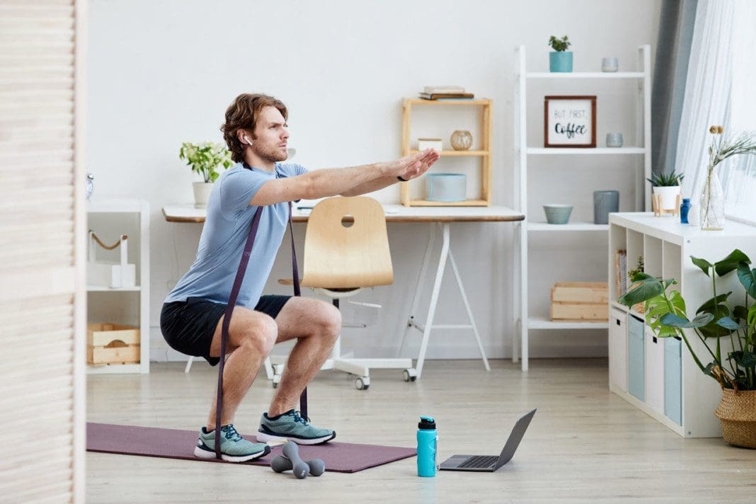 Man exercising at home