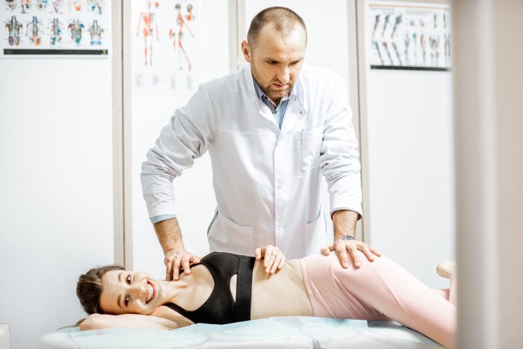Physiotherapist doing manual treatment