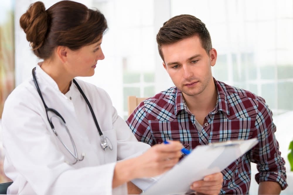 man-talking-to-doctor