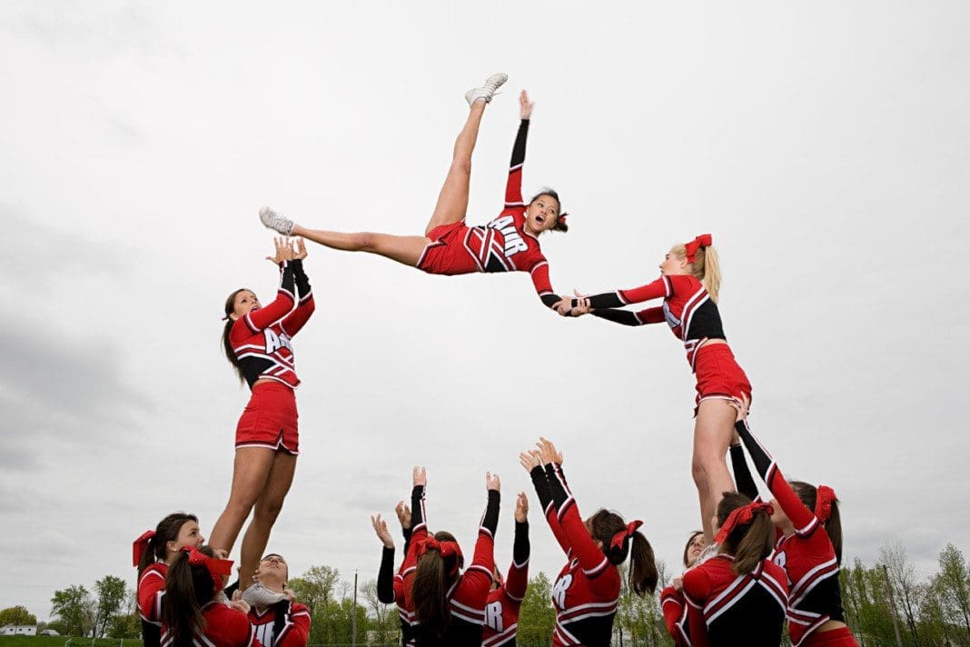 Cheerleaders performing routine