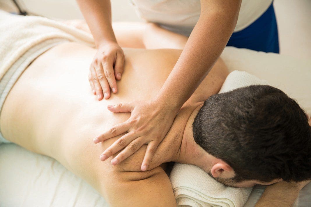 Getting a back rub in a spa