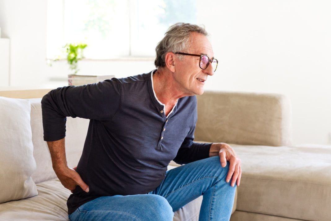 Senior man suffering backache