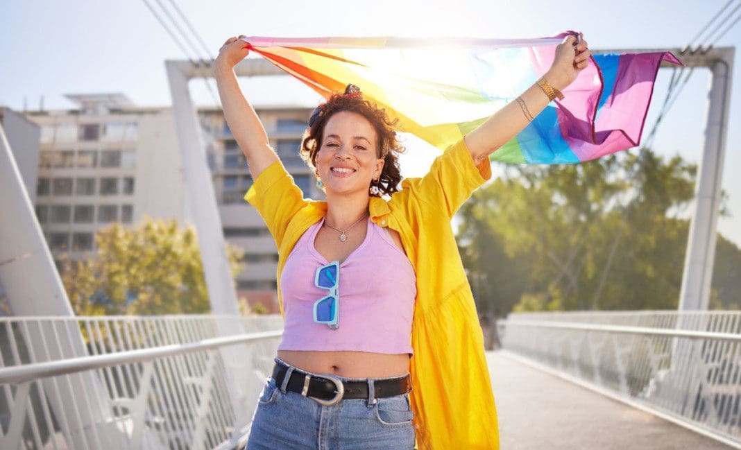 portrait-pride-and-lesbian-woman-with-flag-on-cit-2023-02-03-00-55-49-utc_02