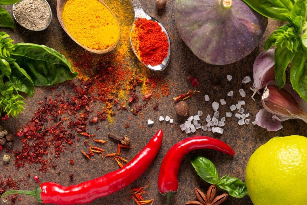 Variety of spices and herbs at table background. Cooking concept