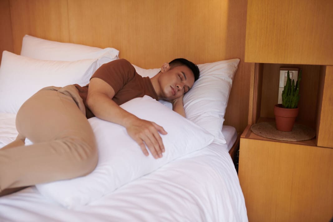 Man Sleeping with Pillow