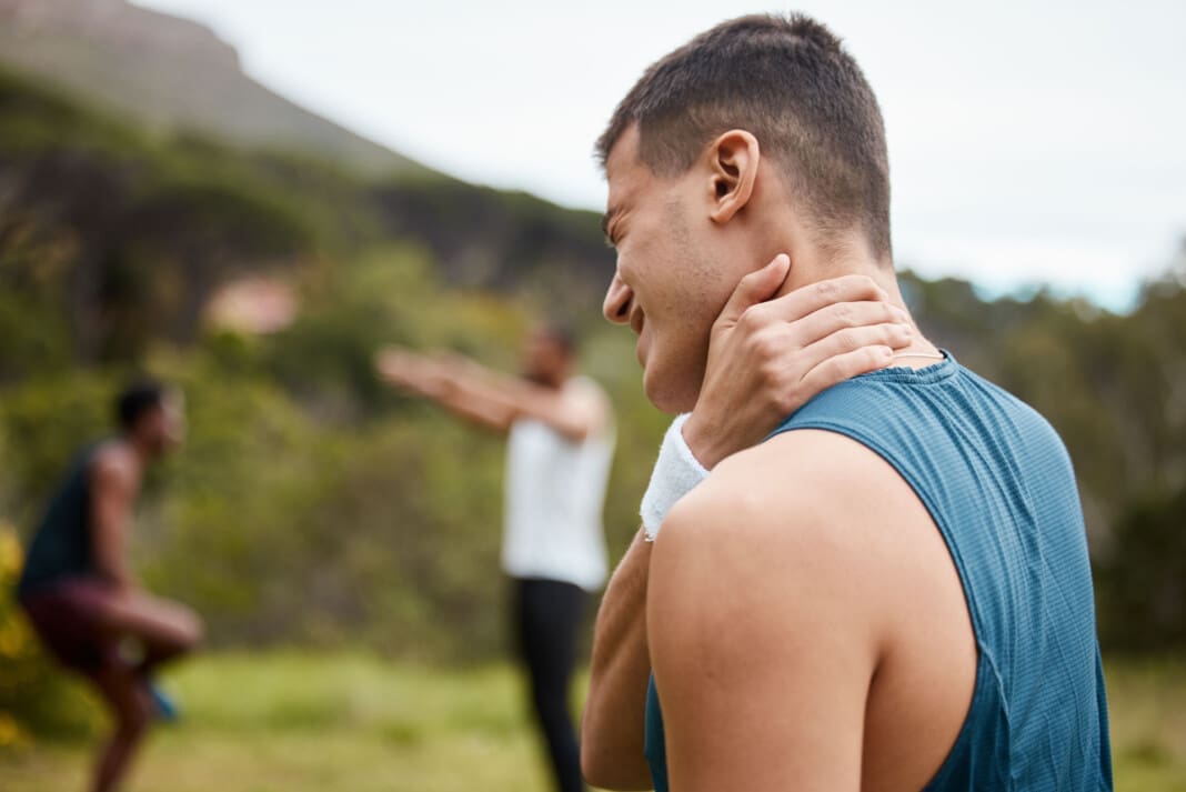 Fitness, nature or athlete with neck pain in exercise, body trai